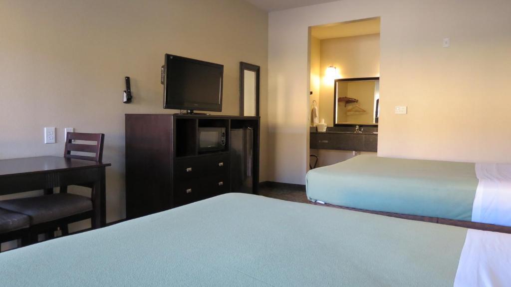 Grand Inn And Suites Houston Room photo